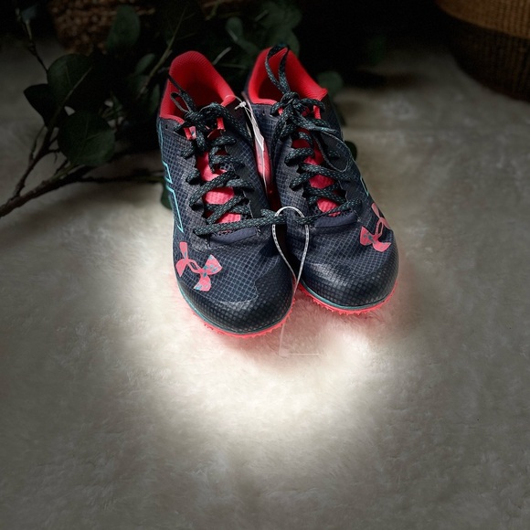 Under Armour Black and Red Athletic Shoes
Unisex Cross Country Shoes - Picture 7 of 10